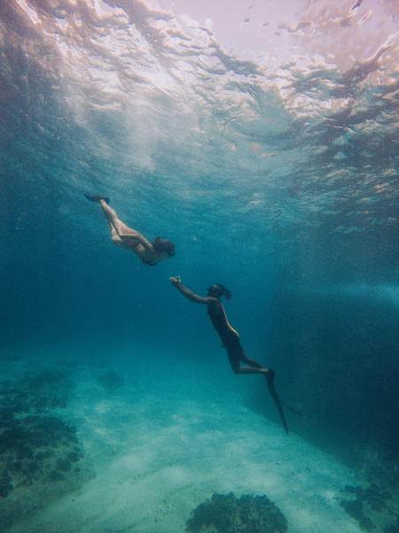 Negril Couple Diving Underwater