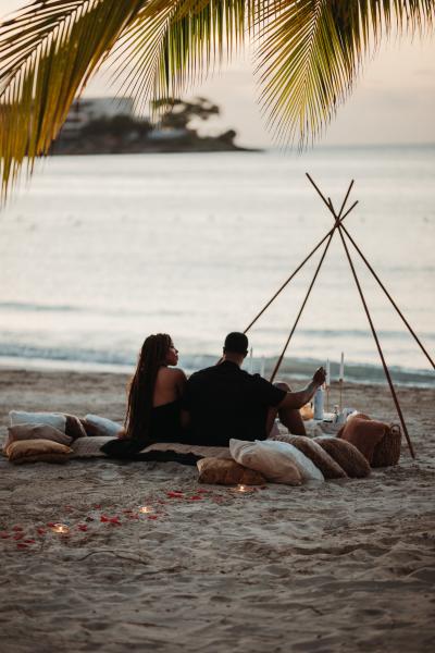 Couple on beach at sunset