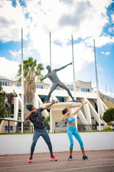 Posing with statues at Independence Park