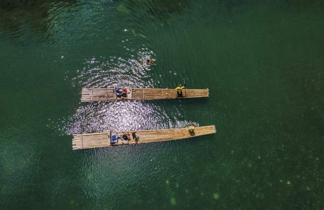 Overhead view of two bamboo rafts on the Rio Grande